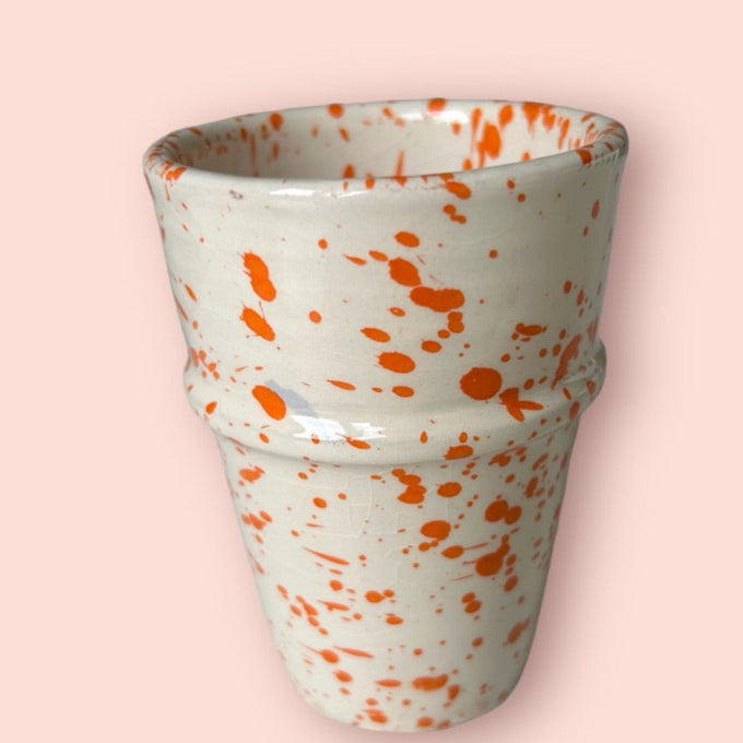 Kopp i stänkmönster orange